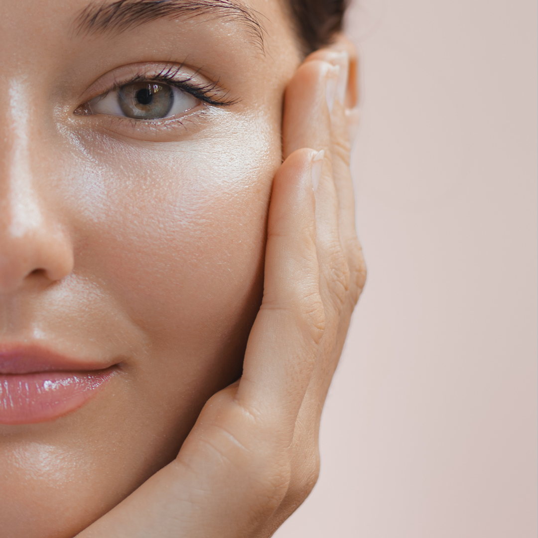 Woman with clean, glowing skin — representing the visible results and confidence that come from using Mythic Cosmetics brush-on masks.

